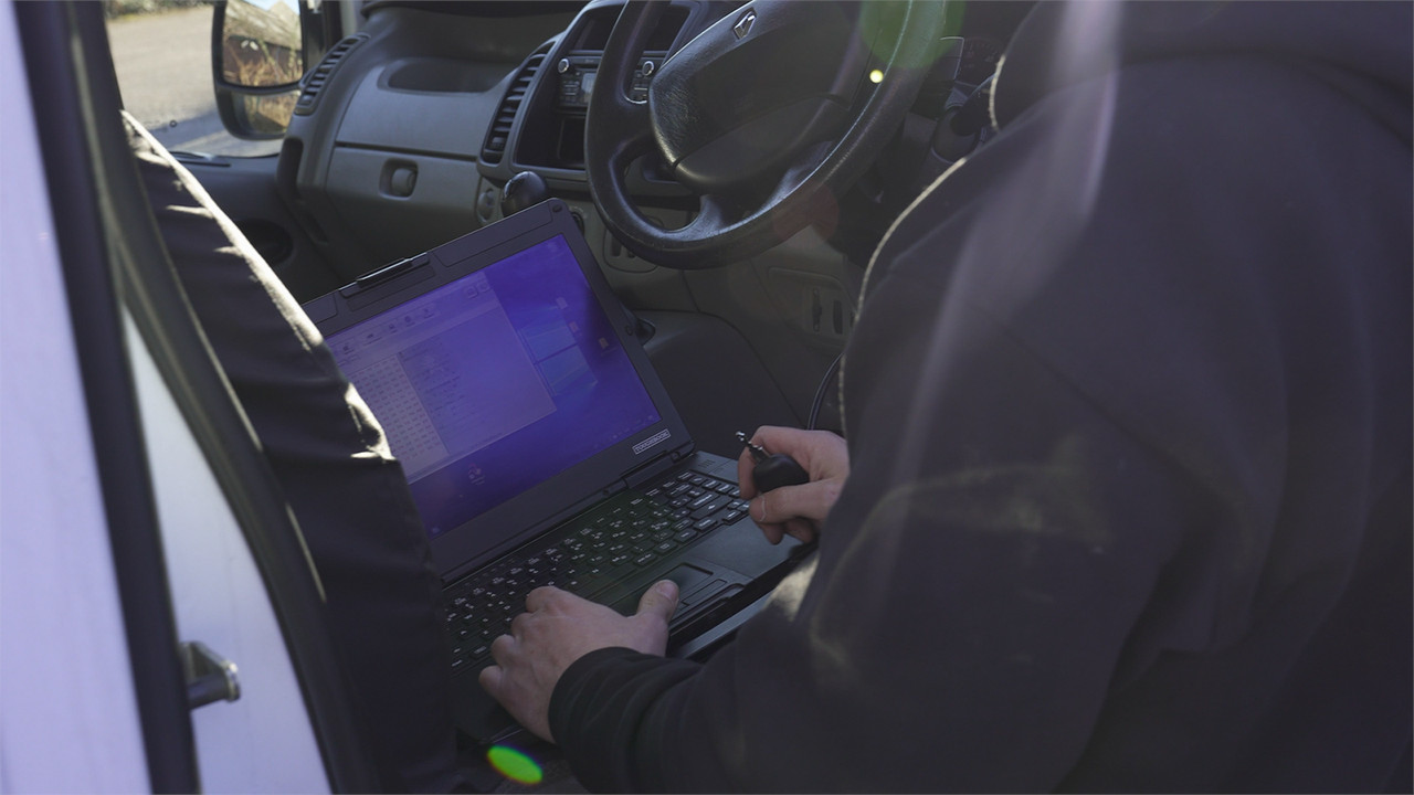 key being programmed through a laptop