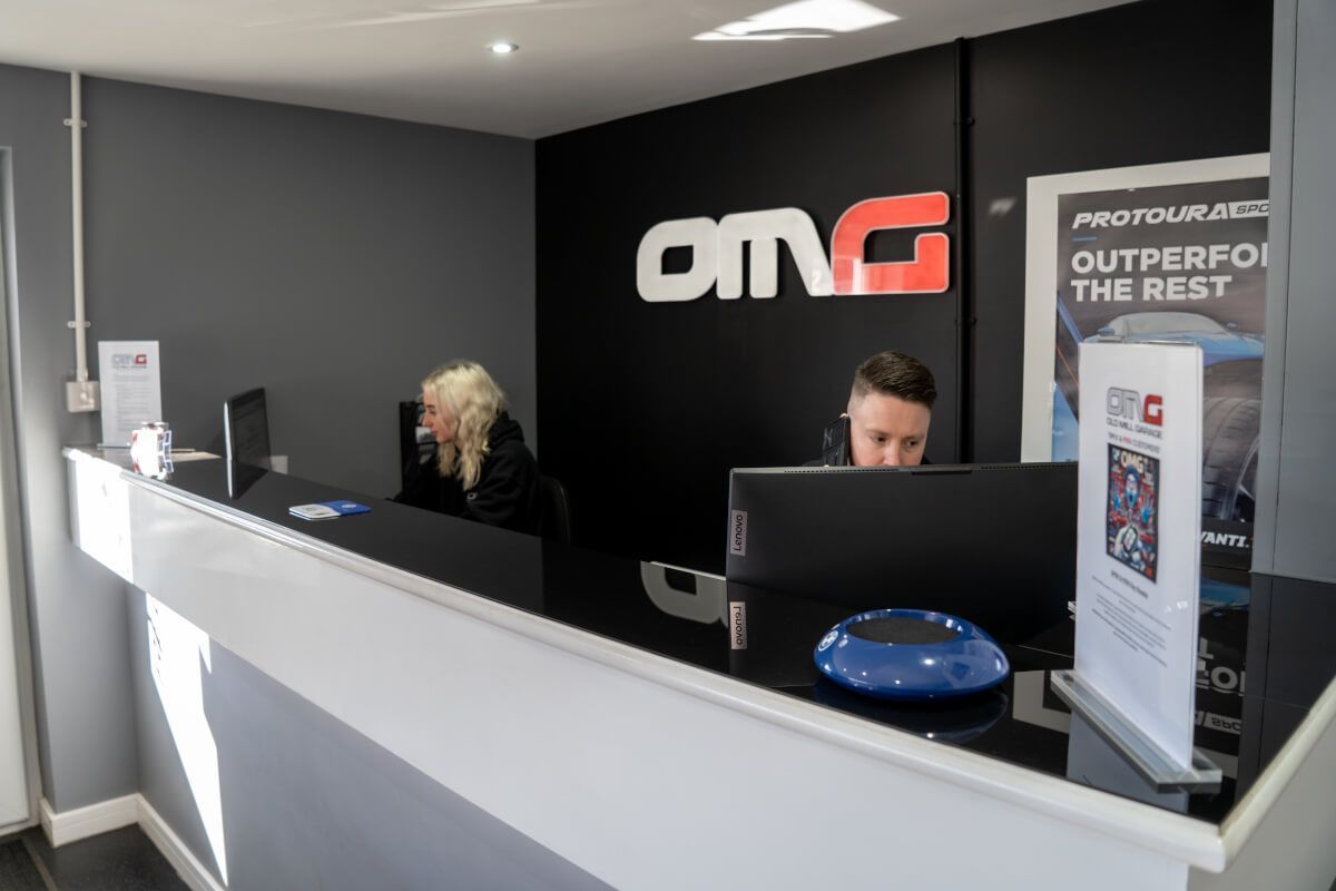 Old mill garage team in the office