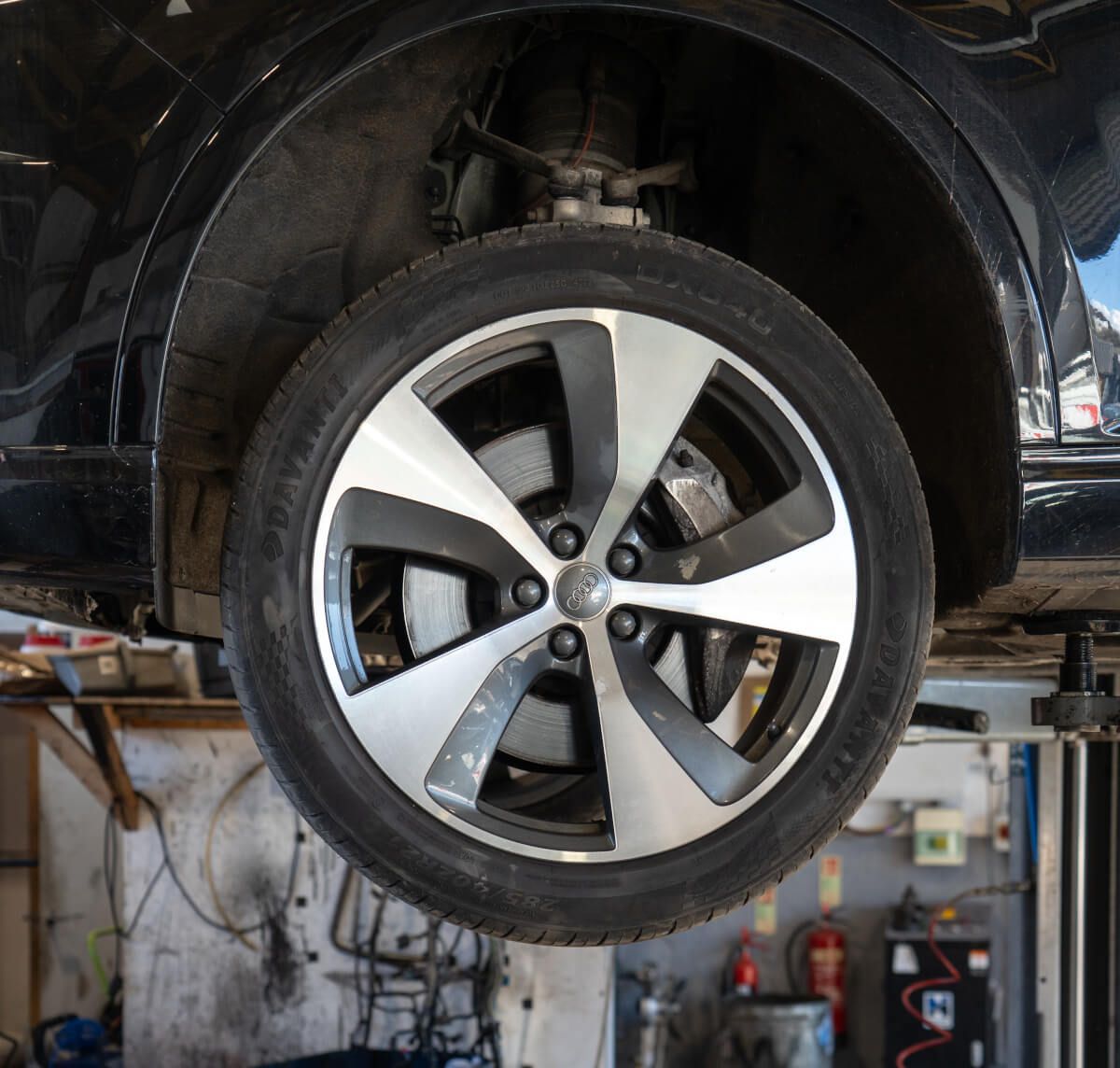 close up of car wheel and brakes